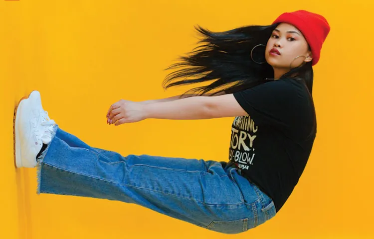Ruby Ibarra in front of yello background