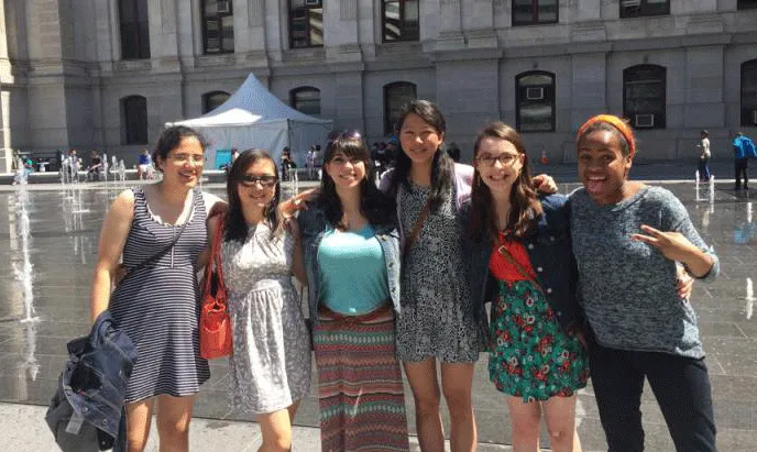 A group of students stand in front of City Hall in Philadelphia