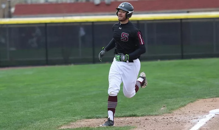 Jackson Roberts rounding the bases