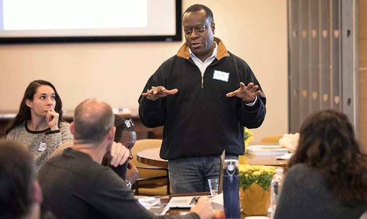 Keith Reeves '88 lectures in front of a class