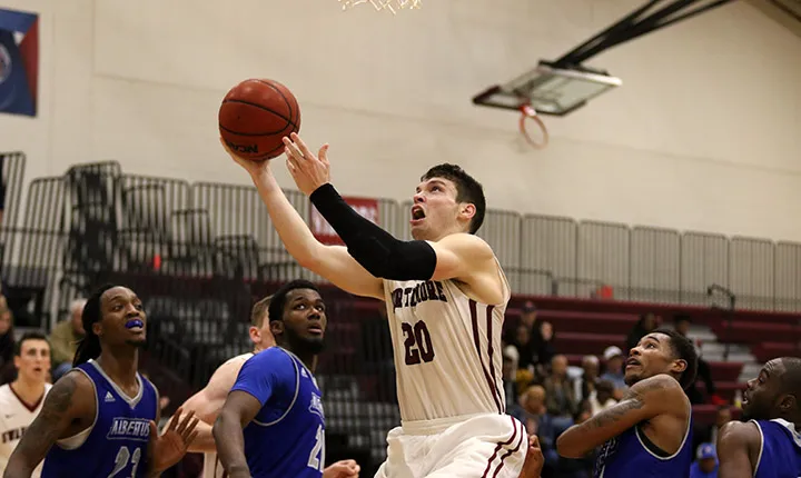 Zack Yonda '18 drives to the hoop