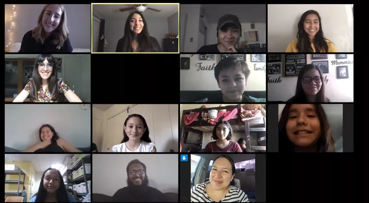 Photo of zoom call with adults and children in gallery mode