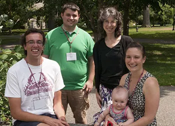 Joe Alberti ’06, Scott Storm ’08, Professor of Educational Studies Lisa Smulyan ’76, Kathleen Melville ’04 and daughter Sonia