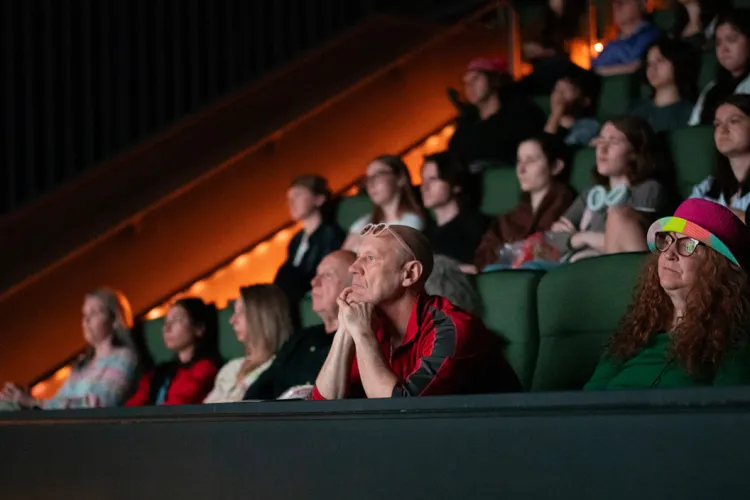 Audience watches film at tri-co film festival