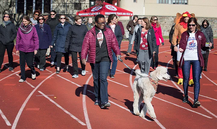President Valerie Smith leads walkers during the Turkey Trot