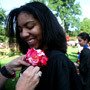 Seniors receive their traditional rose, a gift from the Scott Arboretum, just prior to the ceremony