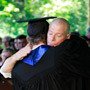 Noah Lang '10 receives a hug from his father, Stephen Lang '73