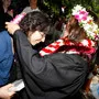 Associate Provost and Professor of Education Lisa Smulyan '76 receives a gift from one of her students
