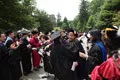 Biology professor Sara Hiebert Burch joins her colleagues in congratulating the Class of 2011.