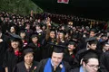 Ashia Troiano '11 and fellow graduates thank their families.