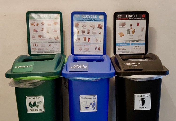 waste station with compost, trash, and recycling bins side by side