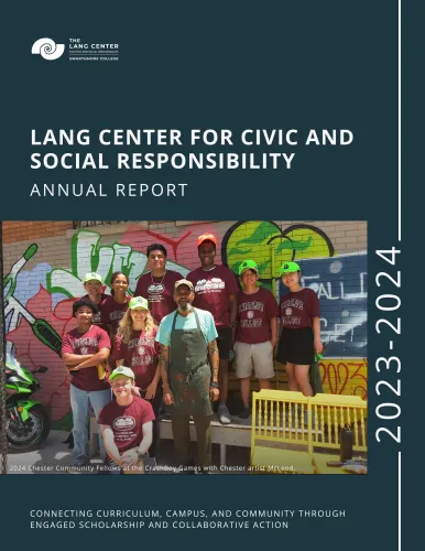 The Annual Report Cover shows a group of students and a community partner standing against a grafiti muralled wall in the sun