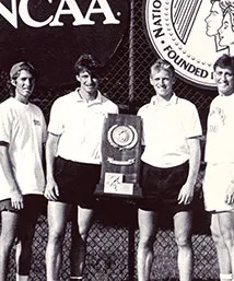 Tennis team with trophy