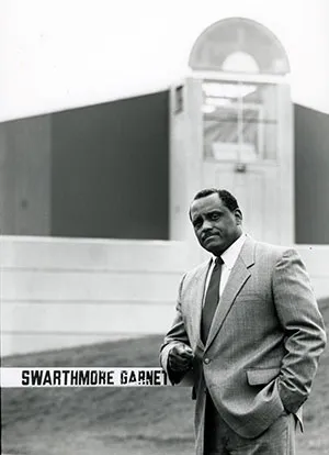 Bob Williams stands in front of lamb-miller field house