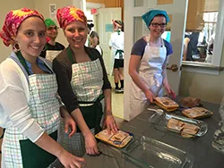 Students help prepare the meal