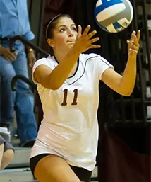 Geny Pezzola serves volleyball
