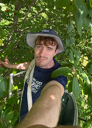 Dylan Scollon in tree