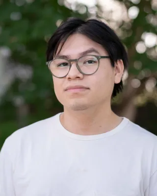 Andrés looks at the camera