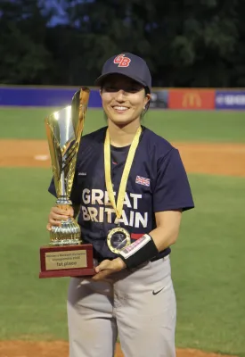 Laura Hirai ’22 holding the first-place trophy at the 2025 Women’s European Championship.
