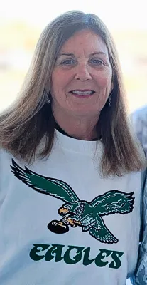 Woman wearing an Eagles jersey