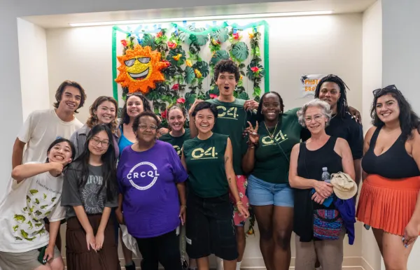 Students wearing C4 shirts gathered with Ms Zulene and Prof DiChiro
