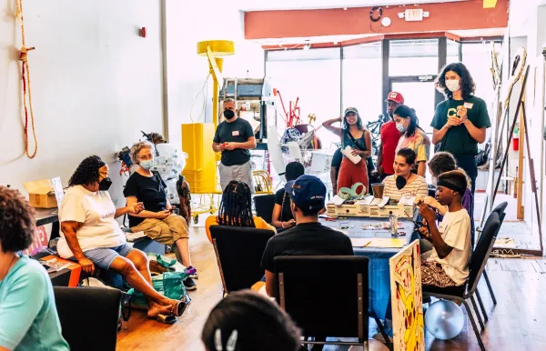 Chester Community Fellows (CCF) having a discussion with Chester Residents Concerned for Quality Living (CRCQL) chairperson Zulene Mayfield.