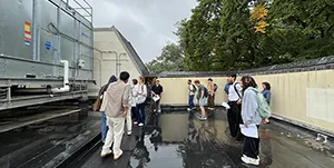 Students on the roof of McCabe as part of a tour for their class