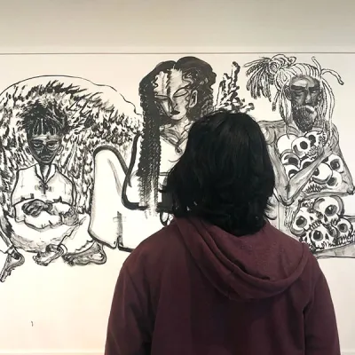 student viewing art