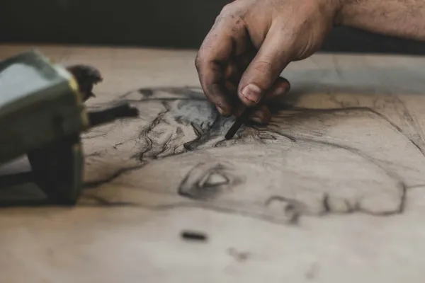 charcoal drawing of a face