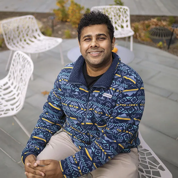 man sitting outside on a patio