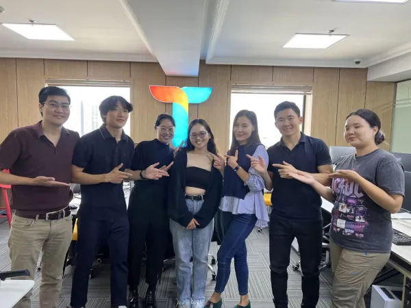 Anuujin Bayarjargal with Tomyo Edtech colleagues