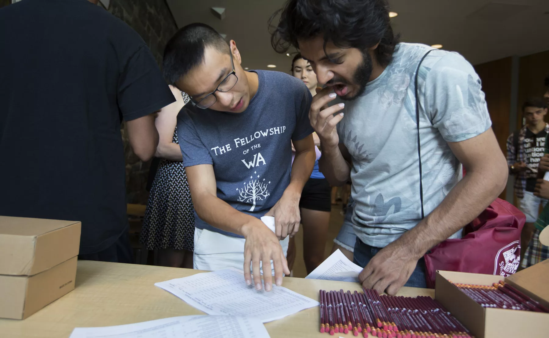 two students talking with each other at the new student advising fair