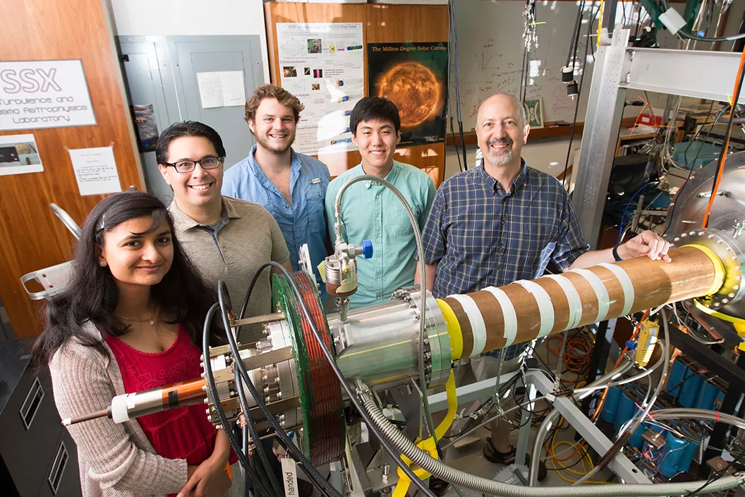 Professor Michael Brown with researchers in lab
