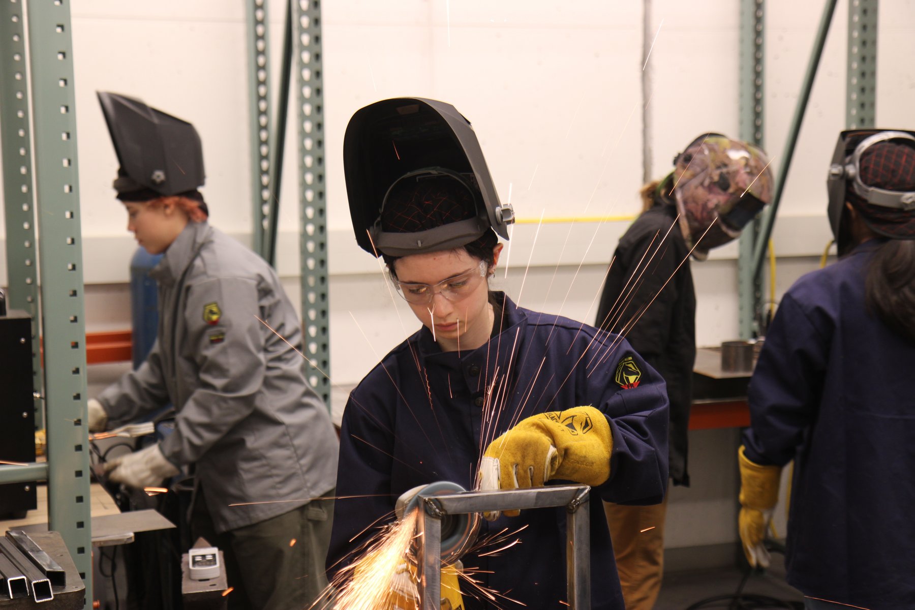 Sculpture II: Metal class. Students practicing welding.