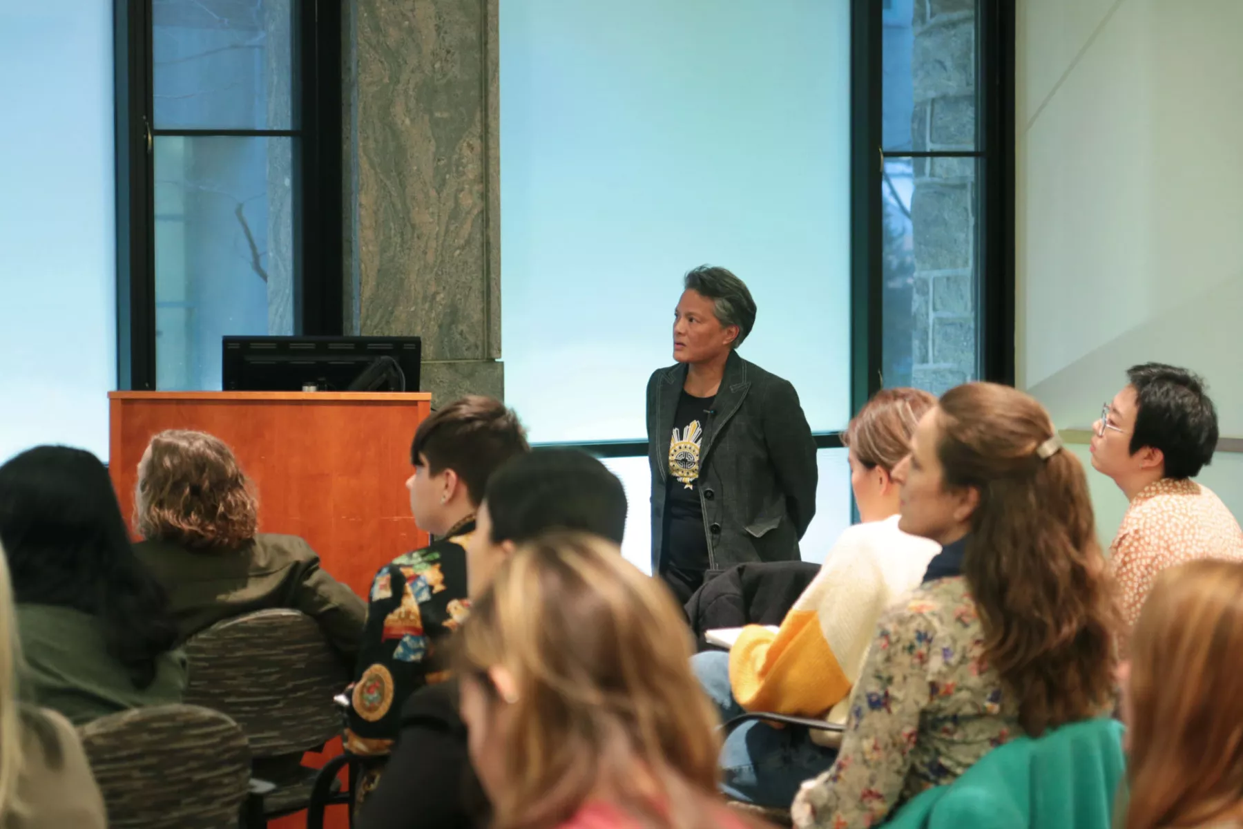 Photo of Dr. Karin Aguilar-San Juan giving lecture.