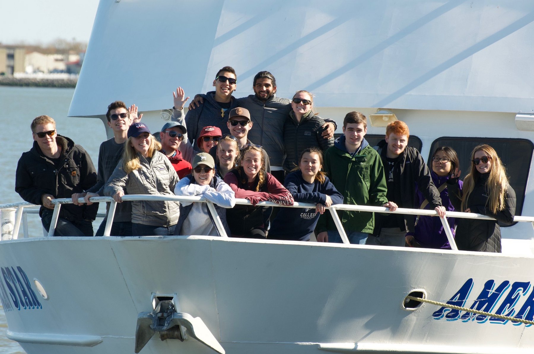 biology students on whale watching vessel