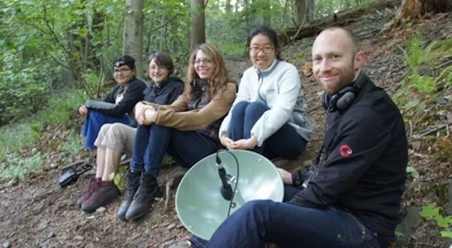 Alex Baugh in crum creek with students