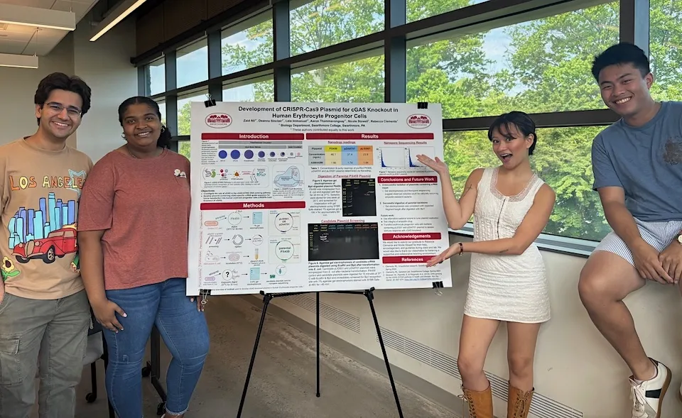 students presenting poster