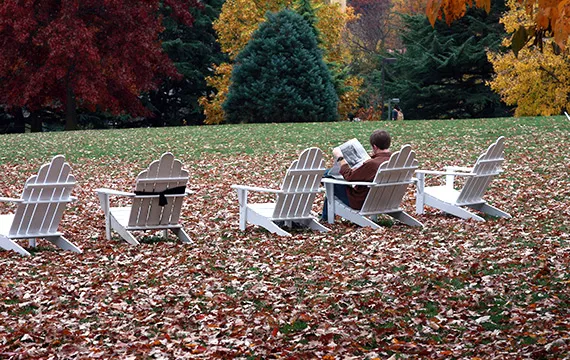 Reading in an Adirondack chair