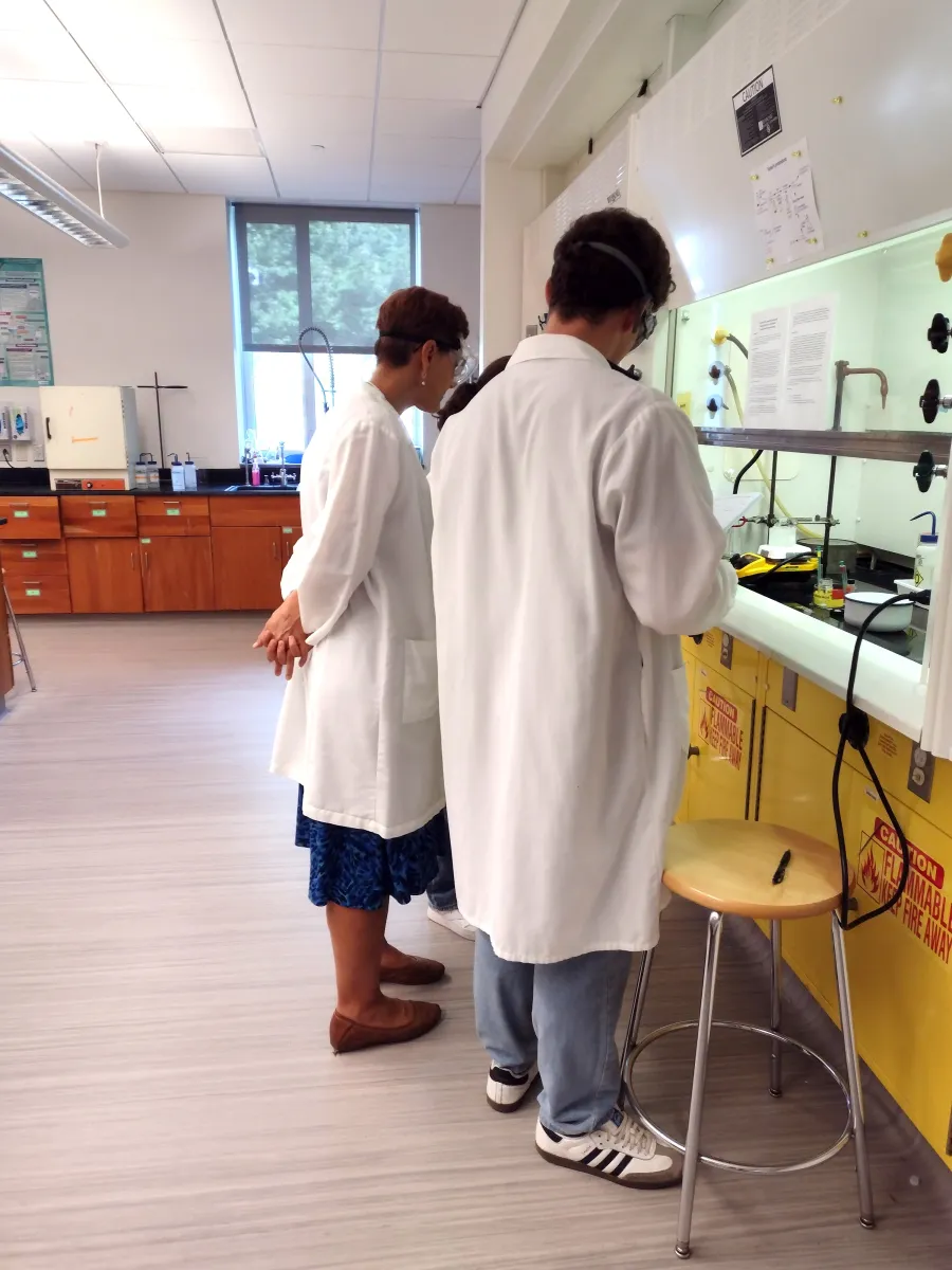 Students conducting research with faculty instructor.