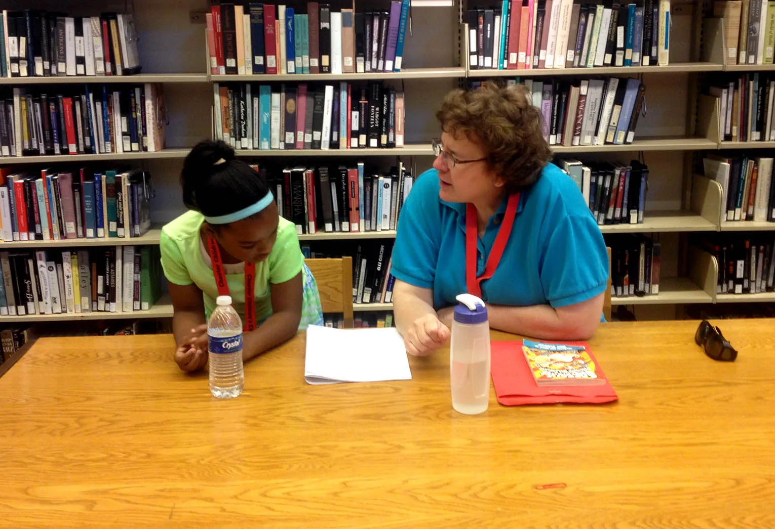 volunteer helping a student
