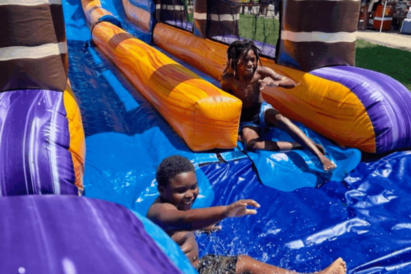 children on water slides, in classrooms, painting, and reading
