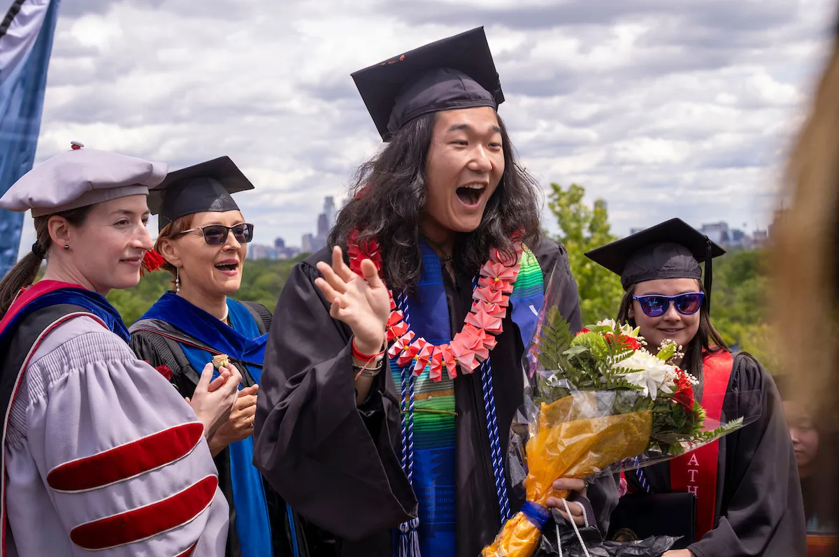 Graduate showing excitement at Commencement