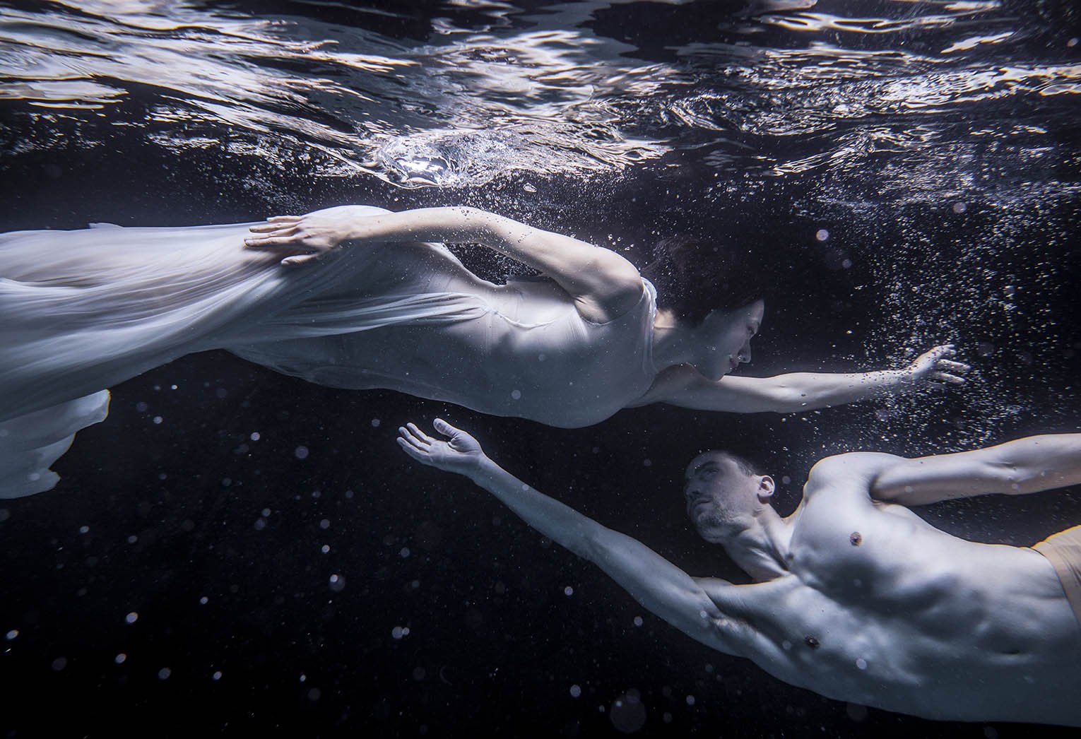 Dancers in water