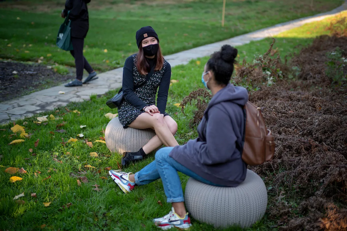 Students converse outside the WRC