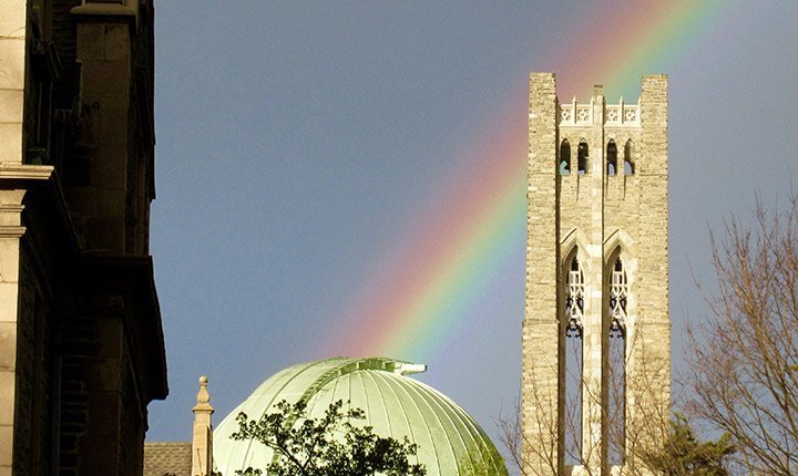 Rainbow in sky behind Clothier tower and IC dome