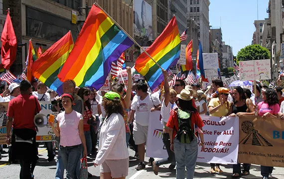 Sager Internship - image of GBLT march with rainbow flags