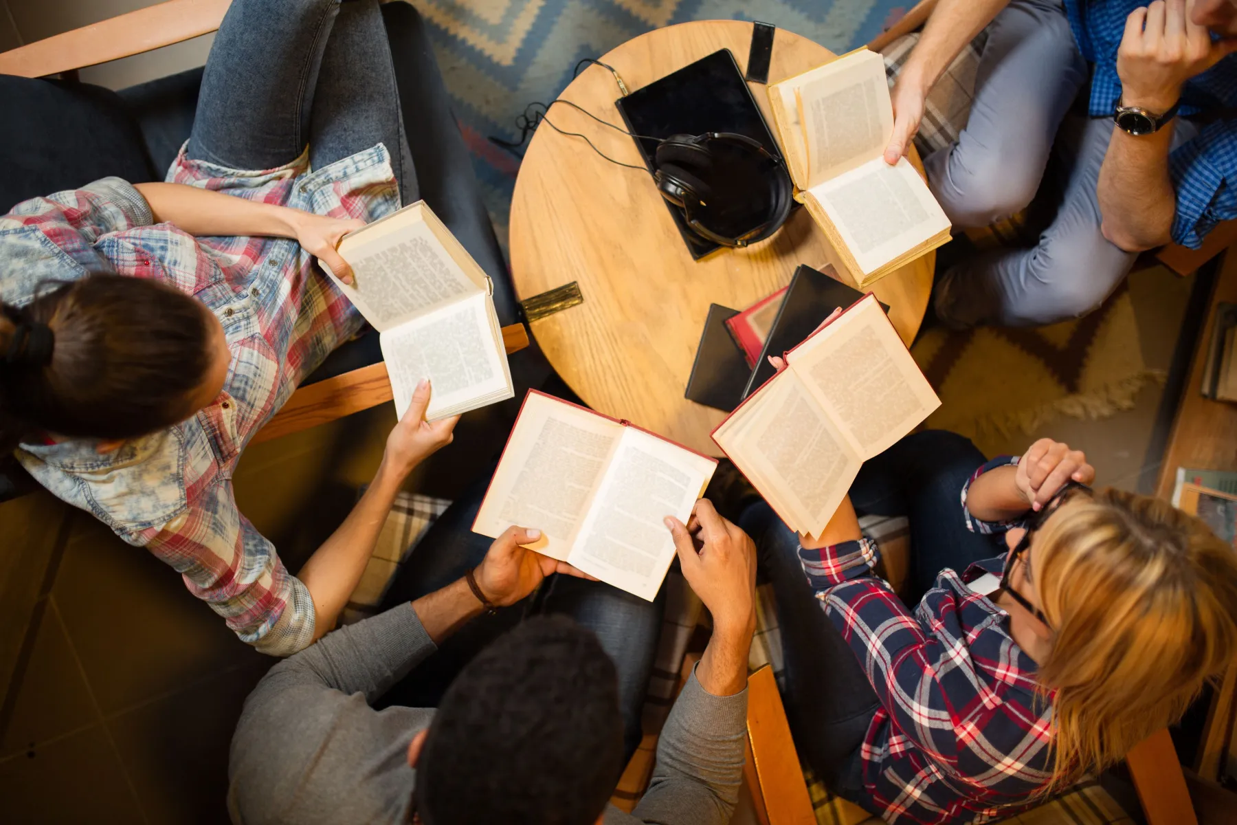 Diverse Group of Friends Discussing a Book