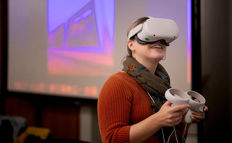 student using a VR headset in the McCabe LibLab