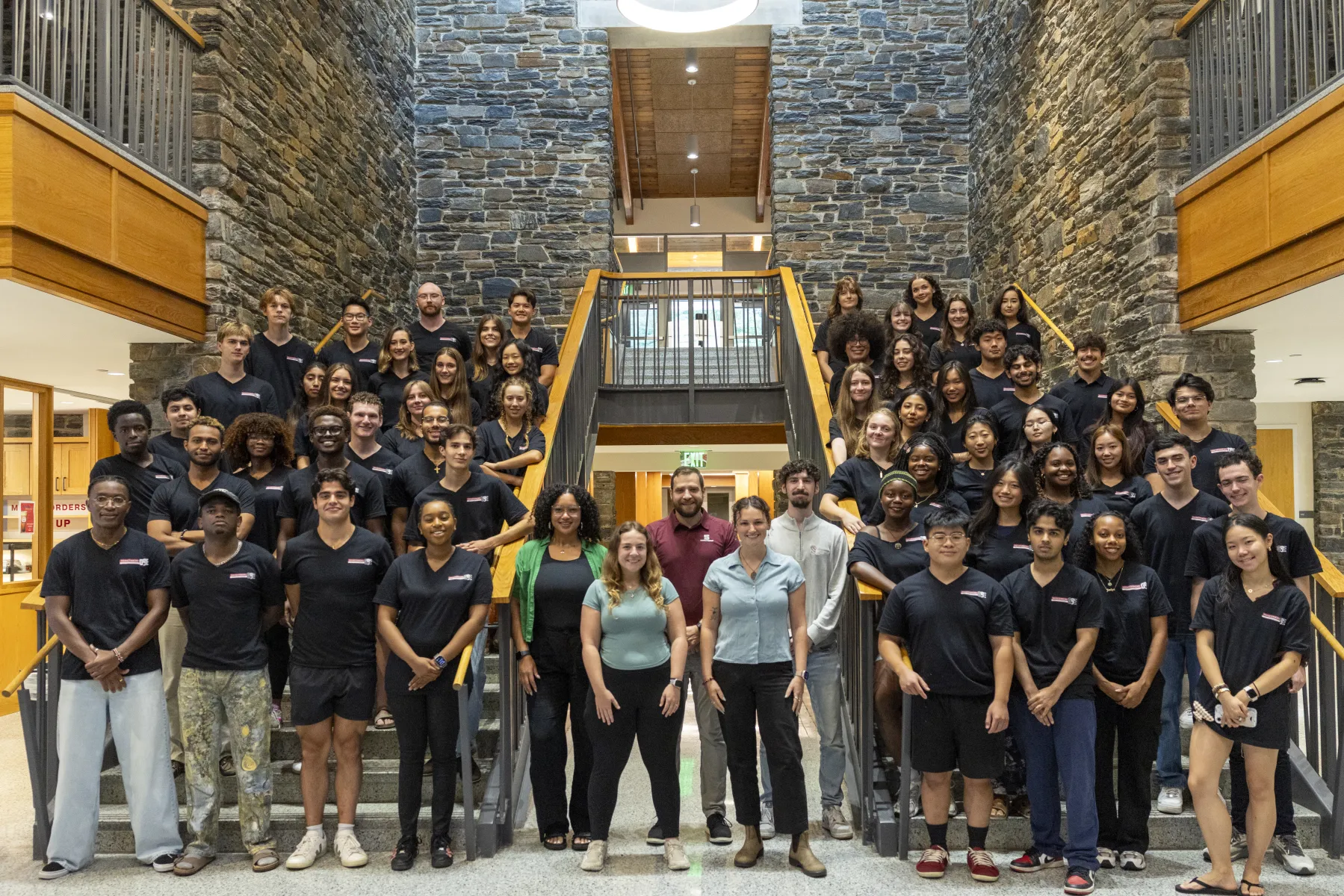 RAs, ACs, and DRC pictured together in a group shot.